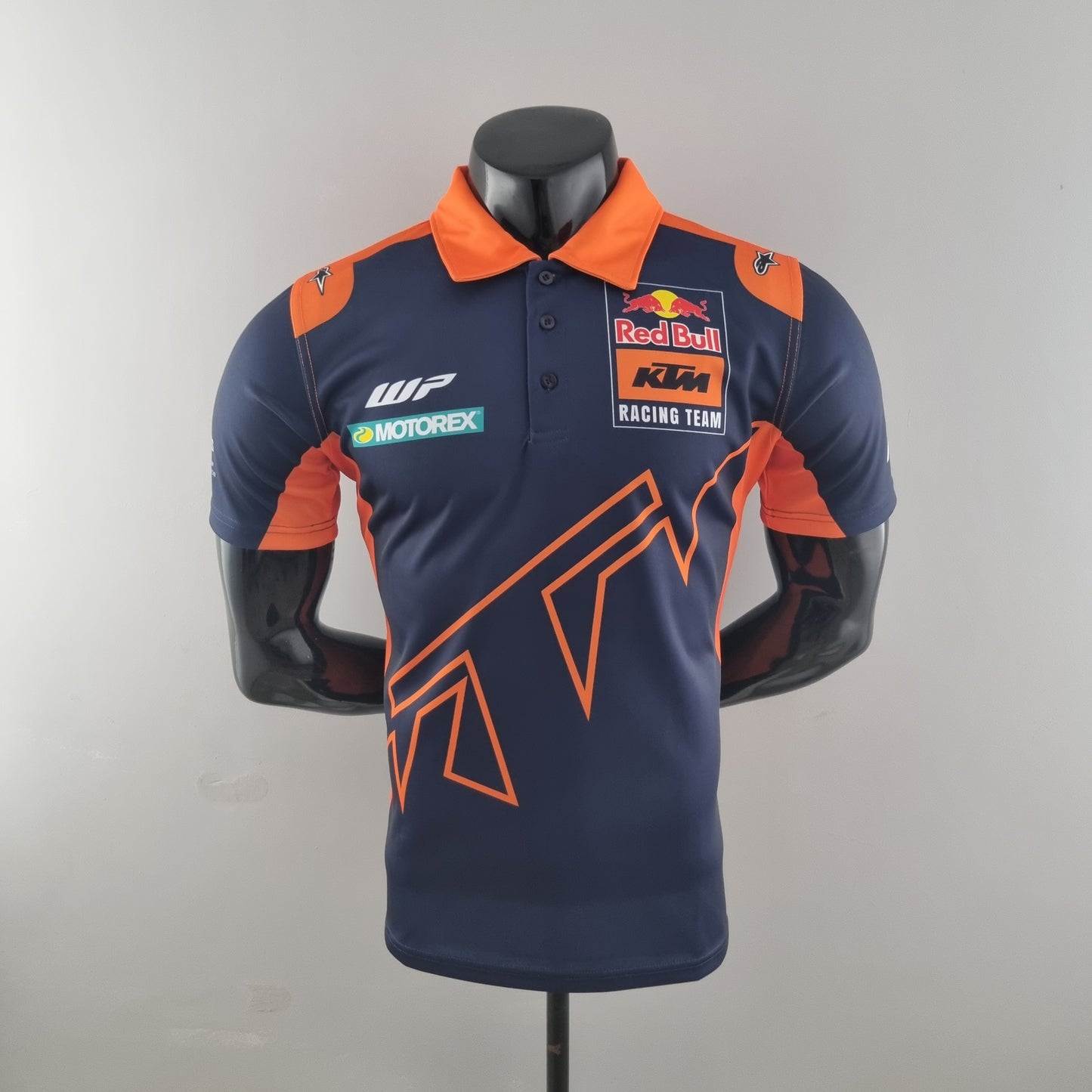 Red Bull KTM Racing Team 2023 Polo – Player Fit | Navy Orange
