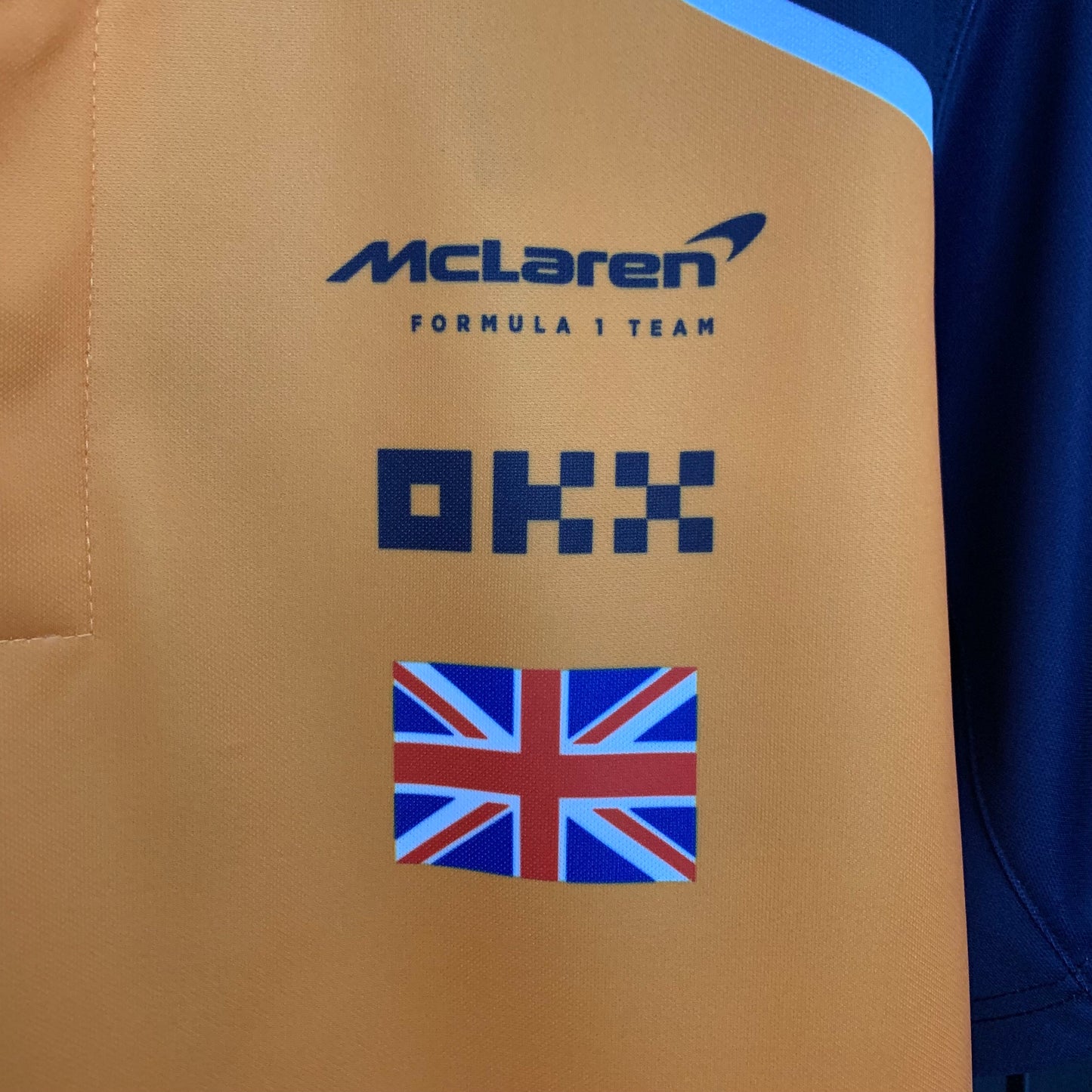 McLaren F1 2023 Polo – Team UK Edition | Papaya Orange