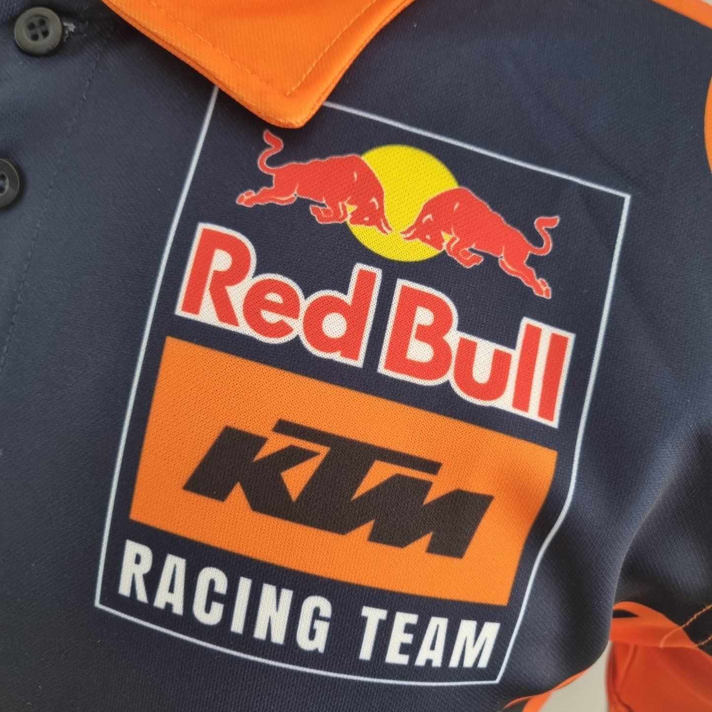 Red Bull KTM Racing Team 2023 Polo – Player Fit | Navy Orange