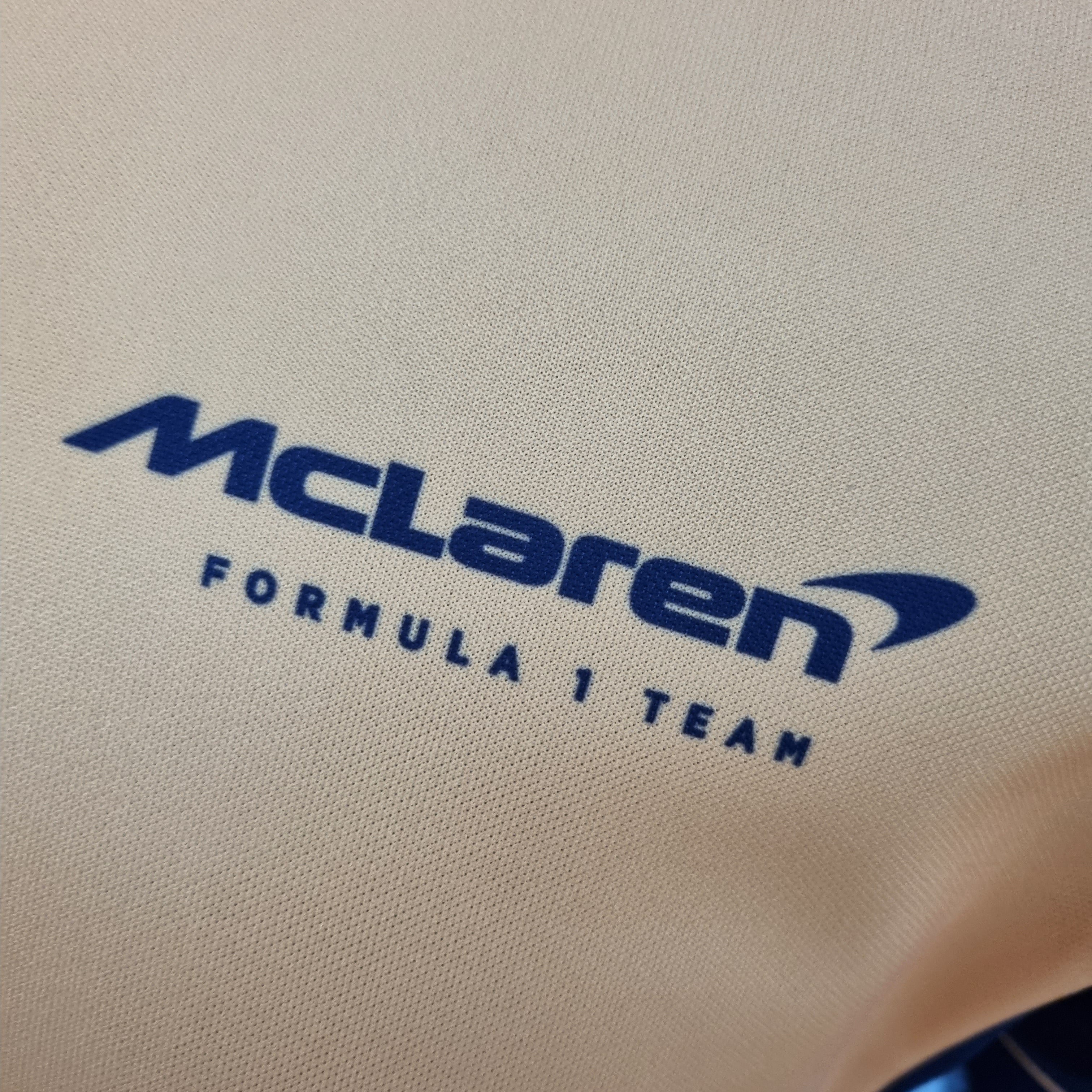 McLaren F1 2023 Polo – Player Fit Dell| Papaya Orange